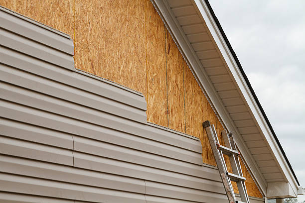 Professional Siding Repair technician working in Newport, OR